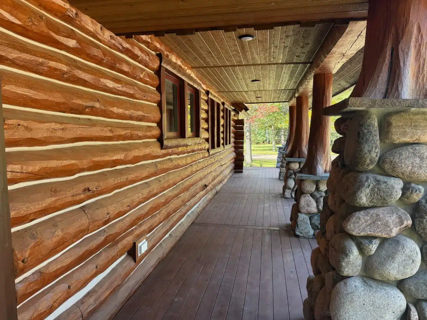Custom exterior with wood beams and chinking
